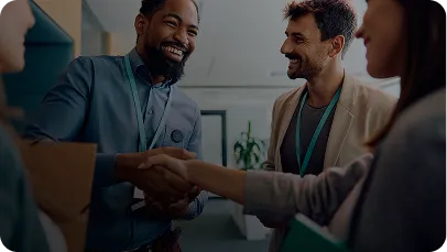 Two sales reps shaking hands