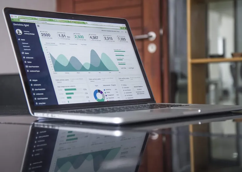 Laptop displaying a project scoping dashboard